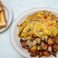 Vegetarian Omelet · Cheese, zucchini, tomatoes, mushrooms and onions.