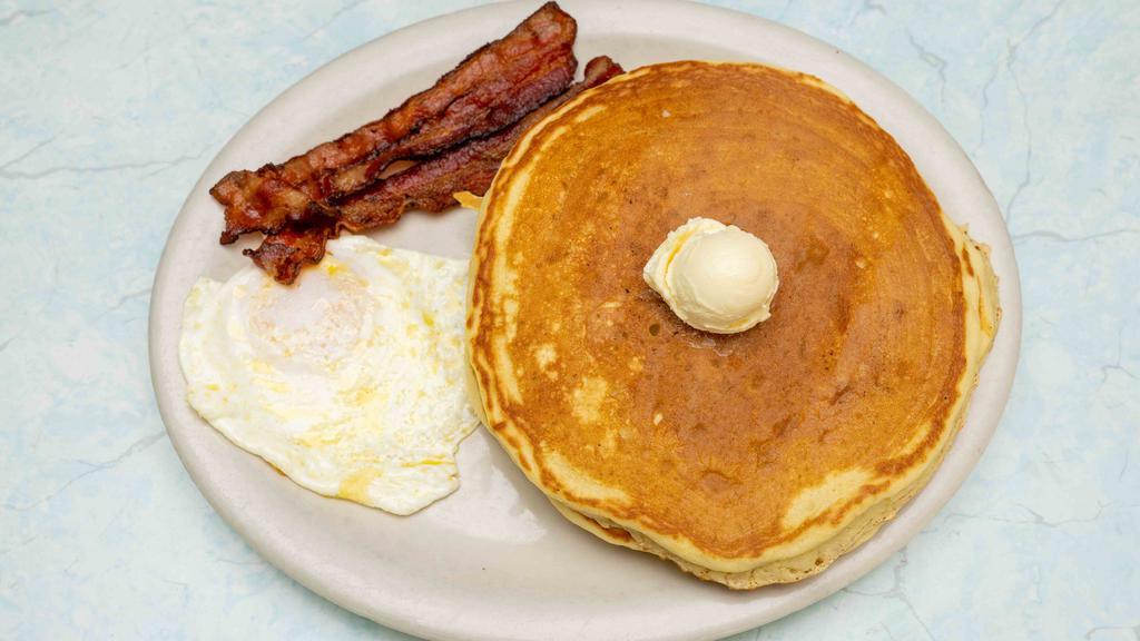 Pancake Special · Two pieces of bacon or sausage, two buttermilk pancakes and one egg (add pancake with blueberry).