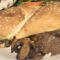 Philly Cheese Steak · Served with onion, bell peppers, mushrooms and jack cheese.