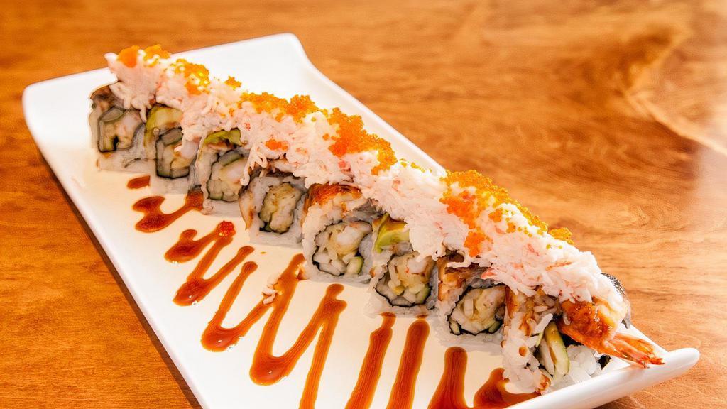 Dragon Roll · #1: Top 10 Best Rolls. Shrimp tempura and cucumber, topped with unagi, crab meat, avocado, tobiko and unagi sauce.