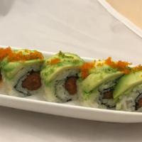 In and Out Roll · Spicy. Spicy tuna, topped with avocado and tobiko.