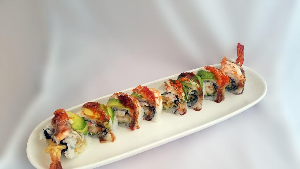 Ebi Heaven Roll · Shrimp tempura, cucumber and crab, topped with ebi, avocado, tobiko and Joy special sauce.