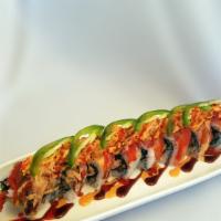 Hella Hot Roll · deep fried salmon & asparagus, topped w/ unagi, tuna, hamachi, salmon, spicy crab, sliced ja...