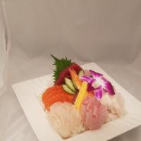 Chirashi Sushi Deluxe Dinner · Large assortment of sashimi over sushi rice.