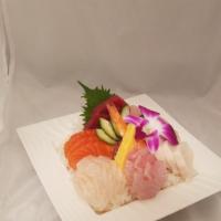Chirashi Sushi Dinner · An assortment of sashimi over sushi rice.