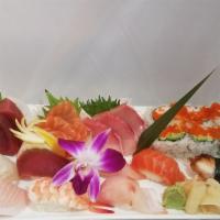 Gourmet Sushi and Sashimi Dinner · Eight pieces of house selected sushi, six pieces of a California roll and nine pieces of sas...