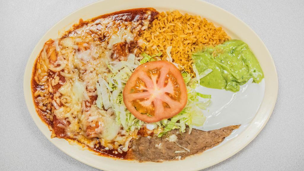 Enchiladas · Choice of meat, rice beans,  guacamole, sour cream, lettuce and choice of green or red salsa.