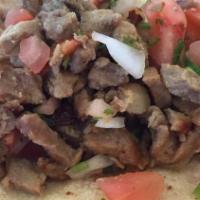 Taco Small Tortilla · Choice of meat and onions, cilantro and salsa.