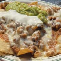 Super · Choice of meat, tortilla chips with melted cheese, guacamole, beans, sour cream and salsa.