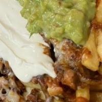Chipotle Fries · Choice of meat, fries, cheese, sour cream , guacamole, & our secret chipotle sauce.