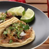 Regular Tacos · Meat. Cilantro, Onions and salsa.