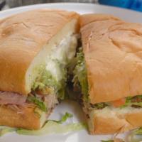 Torta · Meat of your choice, Lettuce, Sour Cream, Guacamole, Pico de Gallo and Jalapeños all in our ...