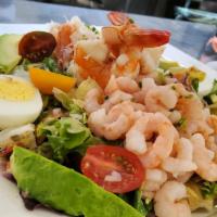 Seafood Louie · Dungeness Crab / Bay Shrimp / Poached Prawns / Avocado / Egg / Tomato / Tossed in Louie Dres...