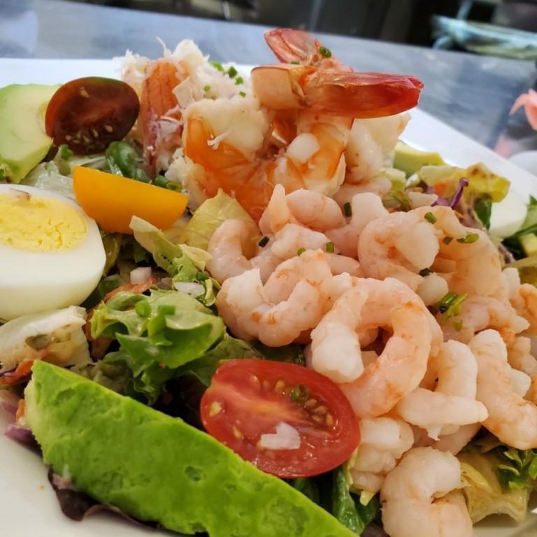 Seafood Louie · Dungeness Crab / Bay Shrimp / Poached Prawns / Avocado / Egg / Tomato / Tossed in Louie Dressing & on the side