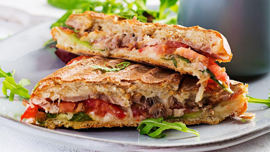 Supreme Sandwich · Fresh, delicious sandwich topped with Turkey, Ham, Roast beef, swiss cheese, lettuce, tomato, red onions, pickles, mayo and mustard, served on Dutch crunch bread.