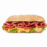 Italian Sub · Fresh, delicious sandwich topped with Ham, salami, mortadella, provolone cheese, lettuce, to...