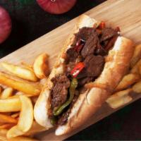 Cheese Steak Sandwich · Fresh, delicious sandwich topped with thinly sliced steak, grilled onion and bell peppers, s...