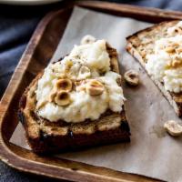 BURRATA BRUSCHETTA · two slices grilled boudin soudough toast, topped with burrata cheese, salt, pepper, and Piem...