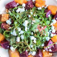 BEET SALAD (Large) · roasted red & gold beets, farro, kale, avocado, goat cheese, and toasted almonds tossed in b...