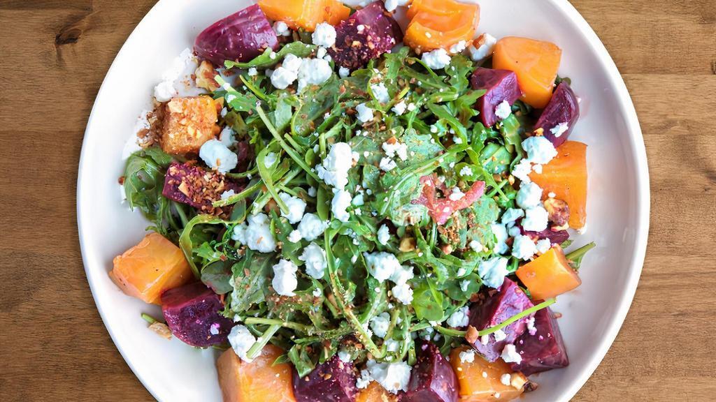 BEET SALAD (Large) · roasted red & gold beets, farro, kale, avocado, goat cheese, and toasted almonds tossed in balsamic viniagrette  * nuts * dairy
