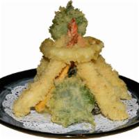 Tempura Shrimp & Veg. · Crispy traditional style Jumbo Shrimp and vegetables deep fried.
4pcs shrimp and 8 pcs veggies