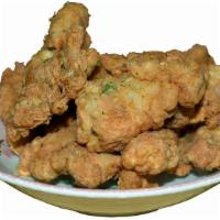 Chicken Kara-Age · Boneless chicken nuggets deep fried with katsu sauce and mayo.