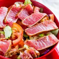 Ahi Tuna · Freshly seared and grilled Ahi tuna, lettuce, shredded carrots, cucumber, edamame and balsam...