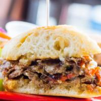 Philly Steak Sandwich · Steak, provolone, grilled bell peppers, grilled mushrooms and grilled onions.
