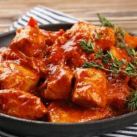 Exotic Chicken Tikka Karahi · Fresh boneless chicken marinated in tikka masala, ginger, garlic, peppers and spices cooked ...