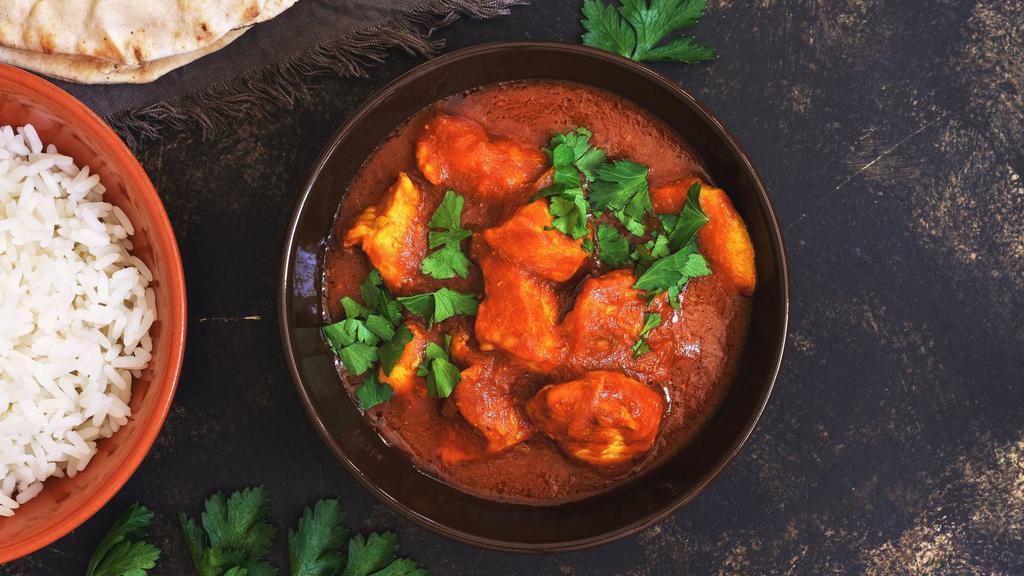 The Chicken Tikka Masala · Customer's favorite! Fresh boneless tender pieces of chicken cooked with tomatoes, bell peppers, onions and tomatoes, flavored with indian herbs.