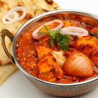 Chicken Vindaloo · Boneless chicken cubes made very spicy and hot curry with potatoes in sharp, tangy sauce.