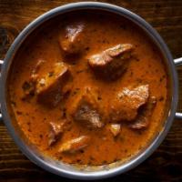 Lamb Tikka Masala · Fresh pieces of tender lamb baked in clay oven and slowly cooked with tomato and onion cream...