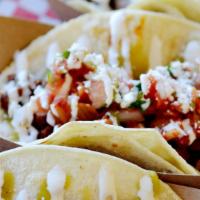 KBBQ Taco · Choice of Corn or Flour tortilla with a choice of  Grilled Chicken, Spicy Pork , or 