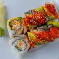 Dragon Roll · Shrimp tempura and crab, topped with unagi and avocado.