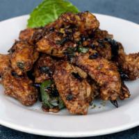 Mandarin Chicken Wings · Sauteed fried chicken wings with chili, garlic and onion in sweet soy sauce, in  Spicy level...