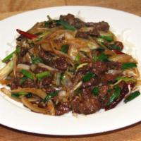 Mongolian Beef  · Sauteed sliced frank steak with onion, scallions and chili in hoisin sauce. Spicy level one.