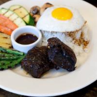 Braised Short Rib Rice Plate · A choice of egg fried rice or a sunny side up egg over steamed rice. Served with grilled sea...