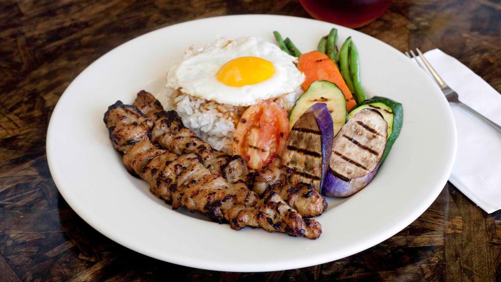Grilled Pork Rice Plate · A choice of egg fried rice or a sunny side up egg over steamed rice. Served with grilled seasonal vegetables.