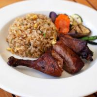 Roasted Duck Leg with Egg Fried Rice · Wok fried rice with egg and scallion