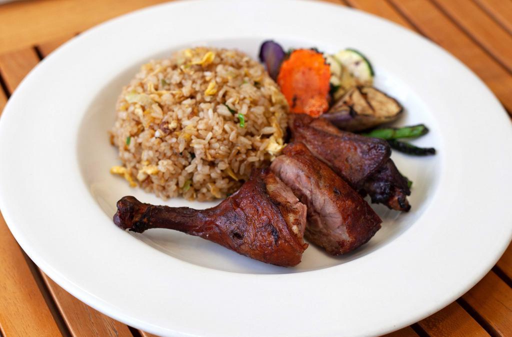 Roasted Duck Leg with Egg Fried Rice · Wok fried rice with egg and scallion