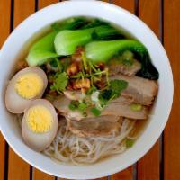 Pork Belly & Roasted Egg Noodle Soup · A choice of lamien or rice noodle with roasted pork belly and soy sauce roasted egg
