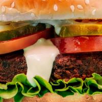 Falafel Burger · Falafel / Tahini Sauce / Pickles / Tomatoes / Lettuce Leaf / Shaved Onions