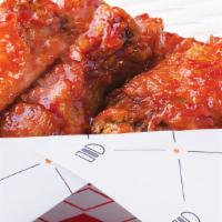 Chicken Wings · Choose 6 Or 12 Or 24 Wings / With your choice of Buffalo, BBQ, Sweet Crunchy Chili Garlic, N...