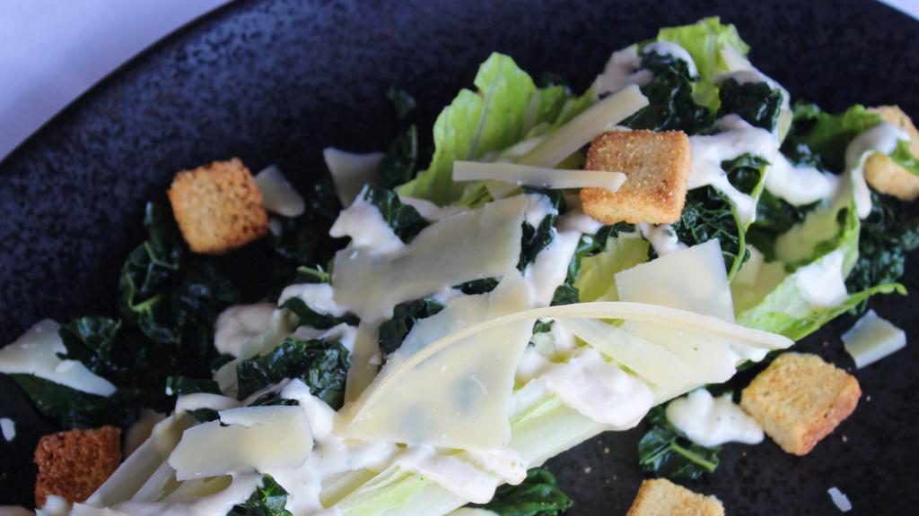 Caesar · Chopped fresh romaine lettuce, croutons and parmesan cheese tossed in a house made Caesar dressing