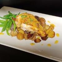 Roast Chicken Breast · Roasted 8 ounce airline chicken breast served with green beans and roasted baby potatoes in ...