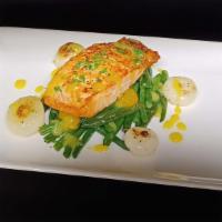 Pan Seared Salmon Fillet · 7 ounce pan seared salmon fillet served with green beans, cippolini onions in a citrus sauce