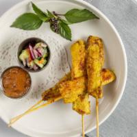 Satay · Vegetarian. Choice of chicken or tofu, marinated and grilled on skewers, served with peanut ...