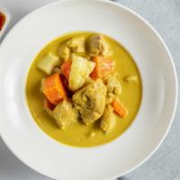 Yellow Curry · Vegetarian. Mild.Served with potatoes and carrots.