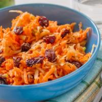 Carrot and Raisin Salad · Fresh salad with cilantro, green onion and a creamy curry dressing.