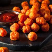 Sweet Potato Tater Tots · Popcorn style tots tossed in a spicy mayo dressing with sliced pepperoncini chives and cilan...